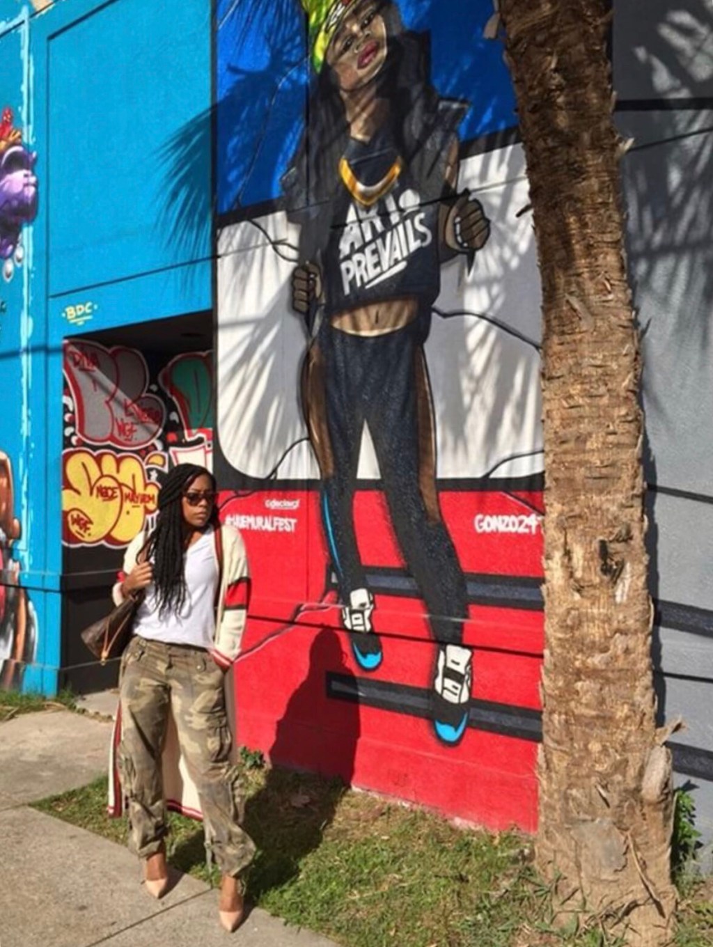 Street Style: Fashion Stylist Yo! in “Prep Chic” cardigan and Journalist Ericka Smith in “Laredo” boots